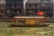 FENGHUANG, CHINA - AUGUST 14, 2018: Boat with hammer and sickle flag on Tuo river in Fenghuang Ancient City, Hunan