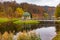 Feofania Park in Kiev. A bridge leading to a round gazebo on a lake in the middle of a lake