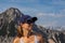 Ferlacher Spitze - Female backpacker enjoying the view on Mittagskogel in the Karawanks in Carinthia