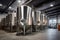 Fermentation mash vats or boiler tanks in a brewery factory. Brewery plant interior. Factory for the production of beer. Modern