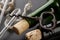 Fermentation tube and corkscrew on a black table. Accessories needed to prepare homemade wine