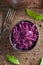 Fermented purple cabbage in a bowl, top view