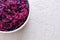 Fermented purple cabbage on a white background with copy space