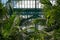 Ferns and palms in the interior of the impressive Winter Garden, part of the Royal Greenhouses at Laeken, Brussels, Belgium.