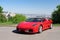 Ferrari F430 - Spider, Italian sports car designed by Pininfarina, photographed by GellÃ©rt Hill lookout point, with the panorama