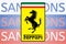 Ferrari logo in front of the sanction text on the Russian flag. Fresh sanctions against Russia over its invasion of