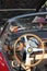 Ferrari steering wheel and dash board of front engined classic car.