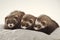 Ferret group on pillow relaxing and posing in studio - portrait