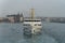 Ferries of istanbul, also known as vapur. Marmara sea and Istanbul cityscape in the background. Bosphorus ride