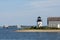 Ferries Pass By Lighthouse on Cape Cod