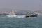 Ferries pass through Victoria harbour