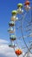 Ferris wheel against a blue sky