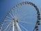 Ferris wheel against a blue sky