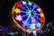 A Ferris wheel is an amusement ride consisting of a rotating upright wheel with multiple passenger-carrying components. Fun Park,