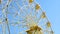 Ferris wheel on blue sky background