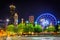 Ferris wheel and buildings seen from Olympic Centennial Park at