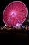 Ferris Wheel and Carnival Fair at Night