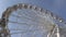 Ferris Wheel Carousel Spinning Blue Sky Background
