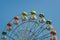 Ferris wheel with carriages.