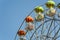 Ferris wheel with carriages.