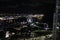 A Ferris wheel in the evening in Miami\\\'s harbor, lit up.