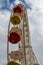 ferris wheel on a fairground with a view from below