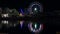 Ferris wheel illuminated in night sky