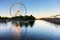 Ferris Wheel of Montreal La Grande Roue de Montreal and the lake at sundown