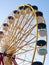 Ferris Wheel Over Blue Sky