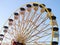 Ferris Wheel Over Blue Sky