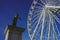 Ferris wheel and statue place de jaude in clermont ferrand