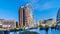 Ferris Wheel surrounded by high rise buildings in Rotterdam, Holland