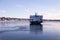 The ferry across the St. Lawrence River arriving at Quebec City from Levis during a cold clear winter afternoon