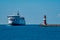 Ferry and beacon on the pier in Warnemuende