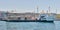 Ferry boat at Kadikoy Ferry Terminal getting ready for sailing after passengers loading at midday, Istanbul, Turkey