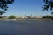 Ferry boat passing the old Royal Naval College in the Thames at Greenwich, England