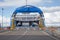 Ferry Boat Ship with open Ramp and empty Car Deck ready to board cars and passengers.