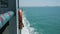 Ferry Boat Side View with Lifebuoy and Sea Waves. HD Slowmotion Background. Thailand.