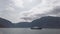 Ferry boat transportation Norway. White passenger ferry goes on fjord. In Norway. ferry crossing a fjord. Ferryboat