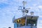 Ferry boat white cabin with big windows. Wing of running bridge of cruise liner. white cruise ship on a blue sky with navigation