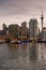 Ferry building and downtown skyline at sunset in Auckland.