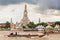 Ferry crossing Chao Phraya River in front of Wat Arun temple in Bangkok