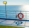 Ferry cruise railing in a blue ocean buoy