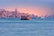 Ferry cruising on the river Tejo near Lisbon Portugal at sunset