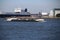 Ferry and inland ships in the water of the port of Rotterdam the