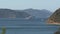 Ferry leaving harbor picton zoom-out, New-Zealand