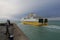 The ferry navigates along the pier in dieppe, normandy towards england