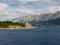 Ferry passing close to Sucuraj lighthouse on Hvar island, Croatia