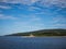 Ferry passing close to Sucuraj lighthouse on Hvar island, Croatia