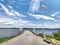 Ferry pier with windsock at the shore of Lipno lake, gentle wind